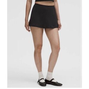 Lululemon Black Tennis Skirt with Built in Shorts and Bow Detail Size M
